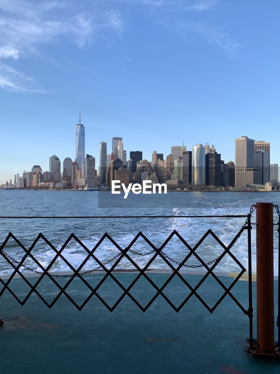 Staten island ferry leaving lower manhattan terminal. outside of the ferry boat 