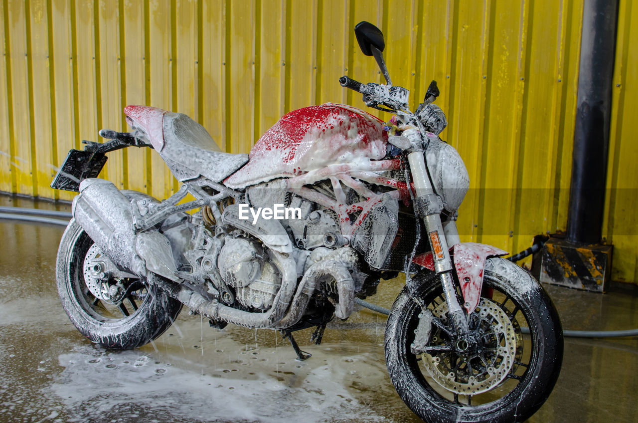 Wet motorbike at garage 