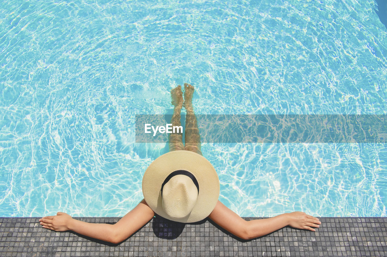 High angle view of woman in swimming pool