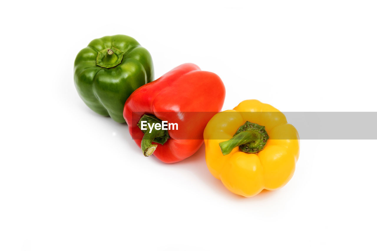 high angle view of bell peppers against white background