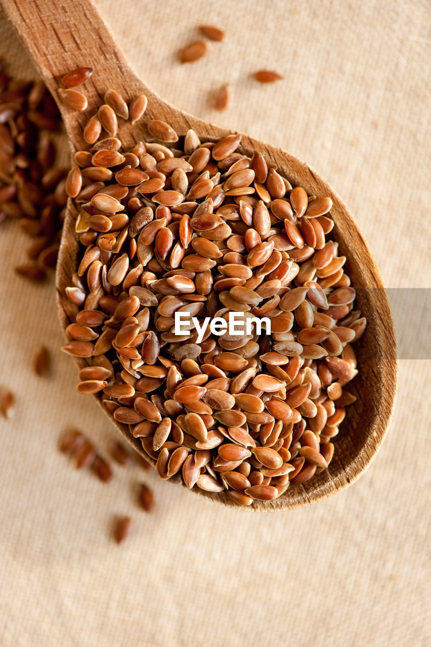 Close-up of seed in spoon on table