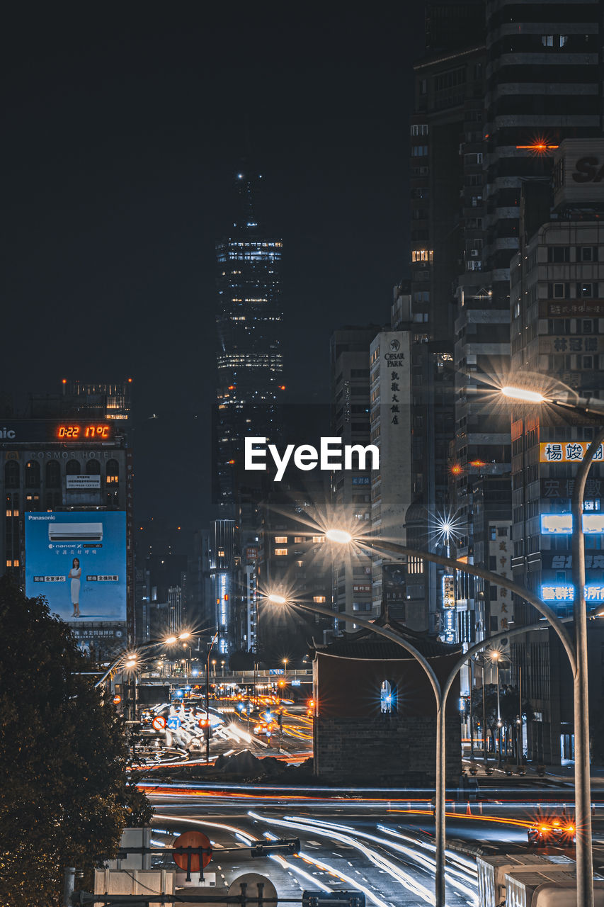 Illuminated buildings in city at night