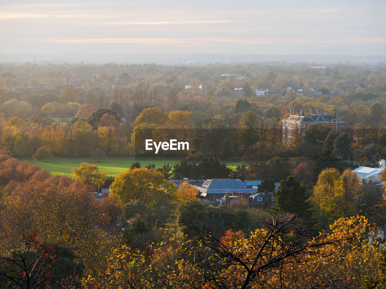 SCENIC VIEW OF RIVER AGAINST SKY DURING AUTUMN