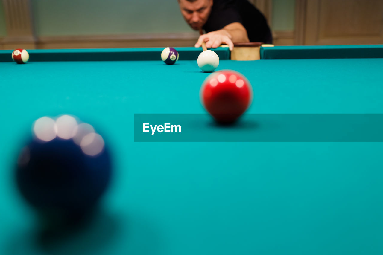 close-up of pool balls on table