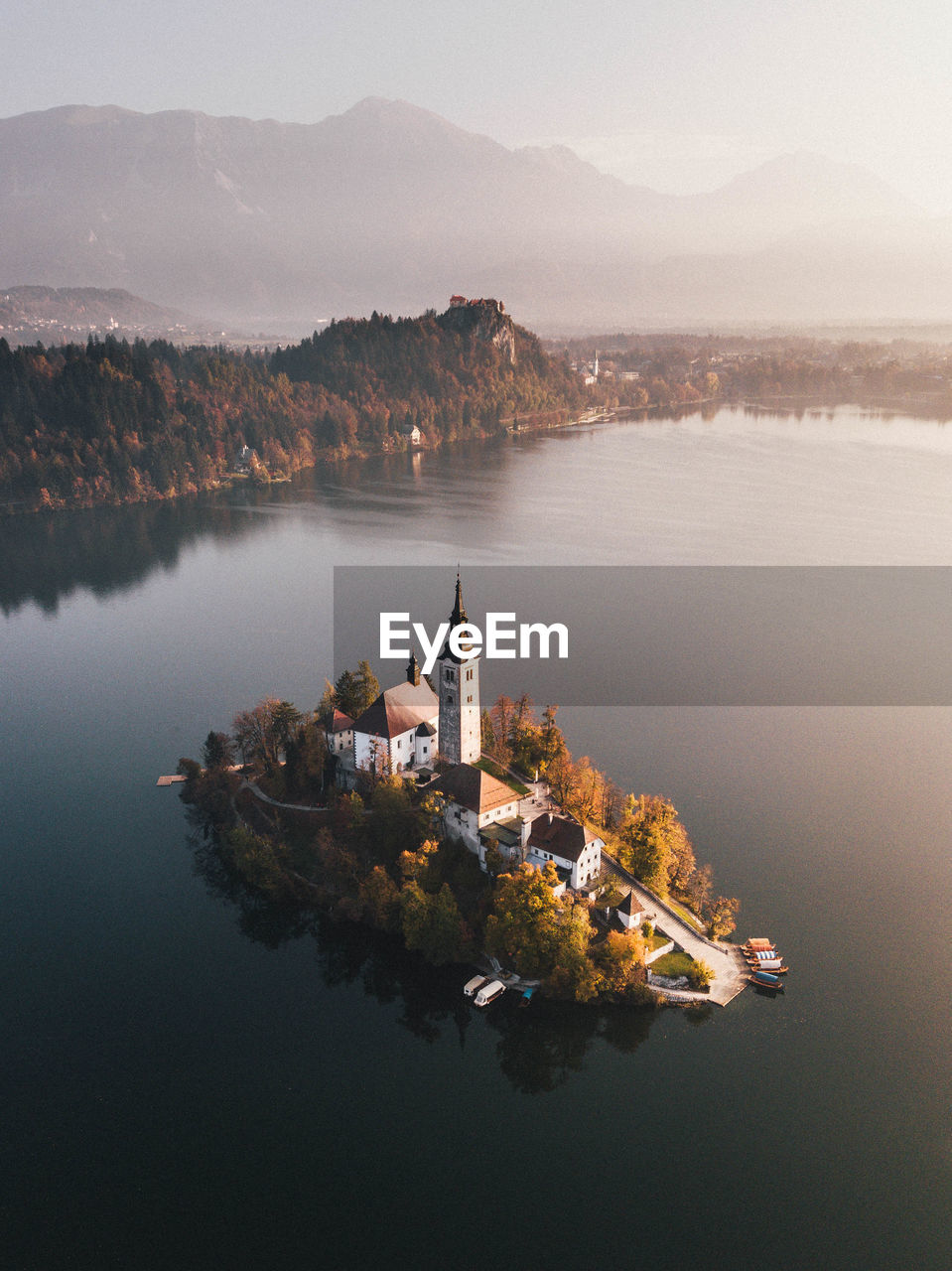 Aerial view of church in sea against sky