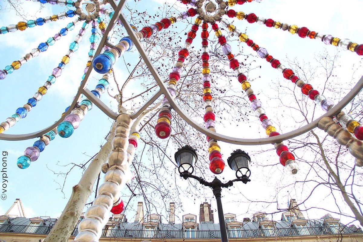 Low angle view of beads decoration in park