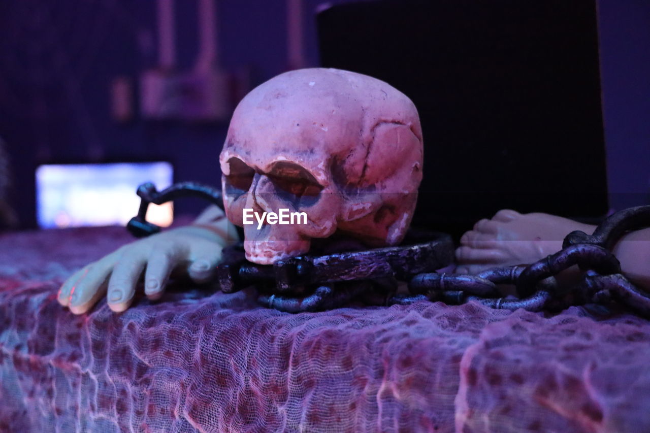 low angle view of senior man sitting on table