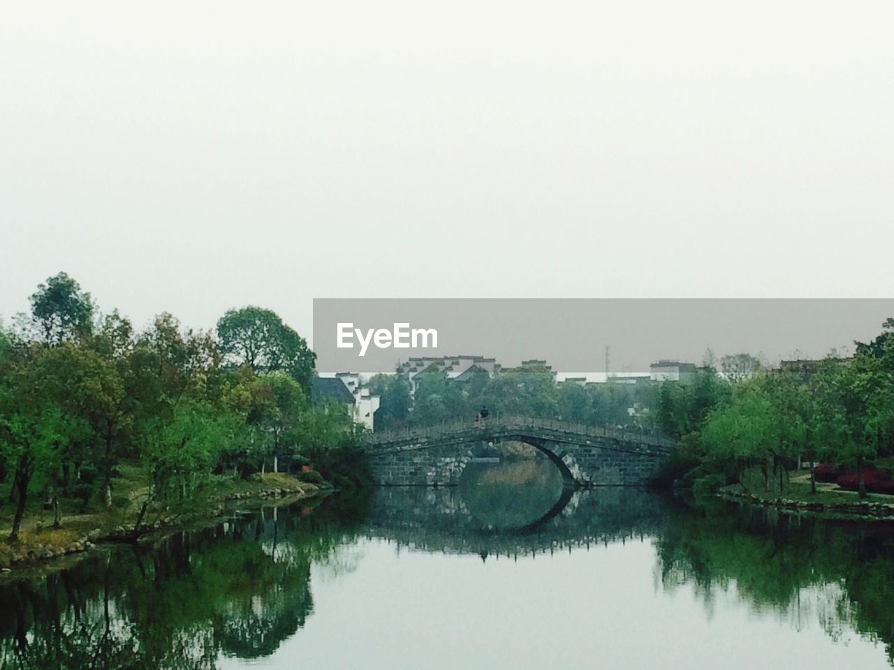 SCENIC VIEW OF CALM LAKE