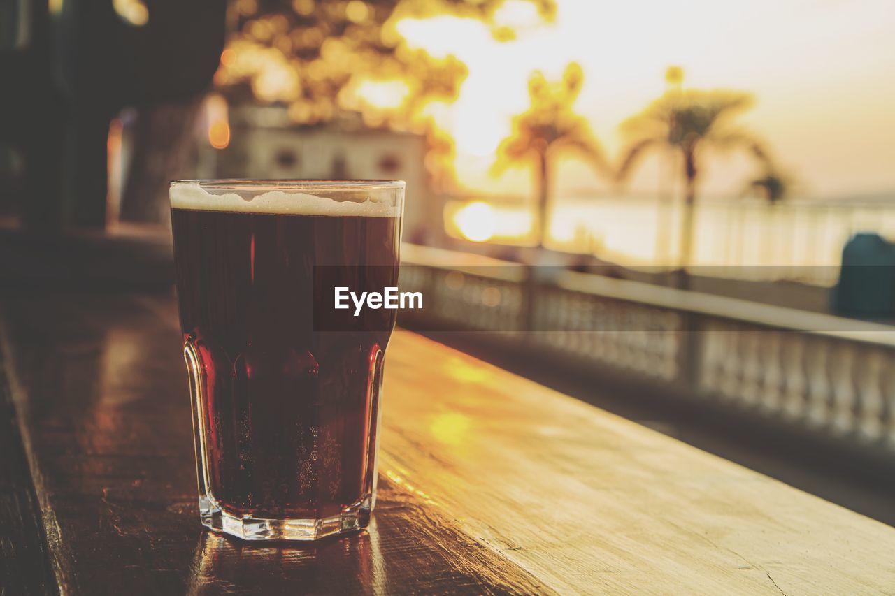 Close-up of beer glass on table