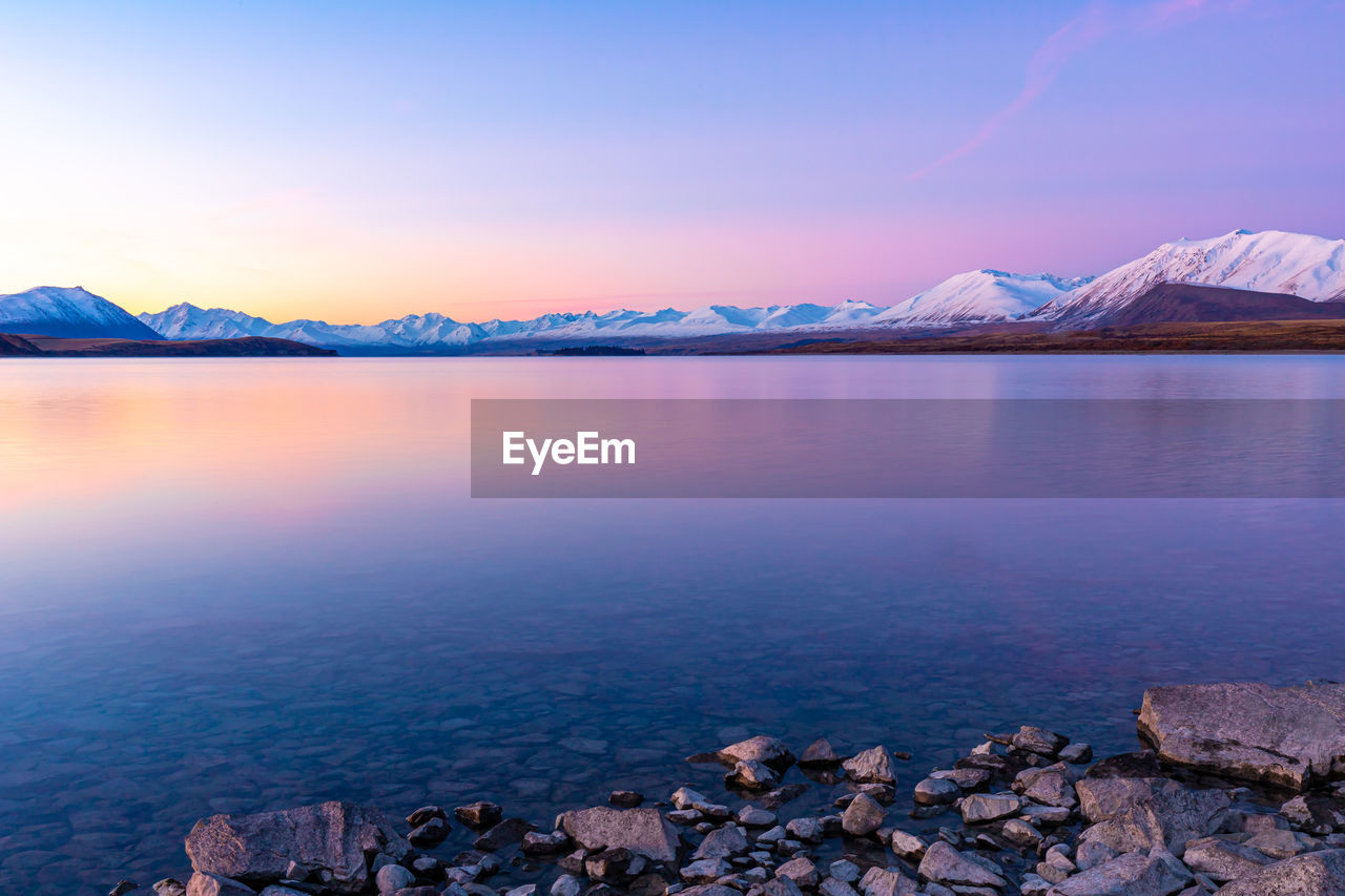 Lake tekapo mountain landscape south island new zealand sunset