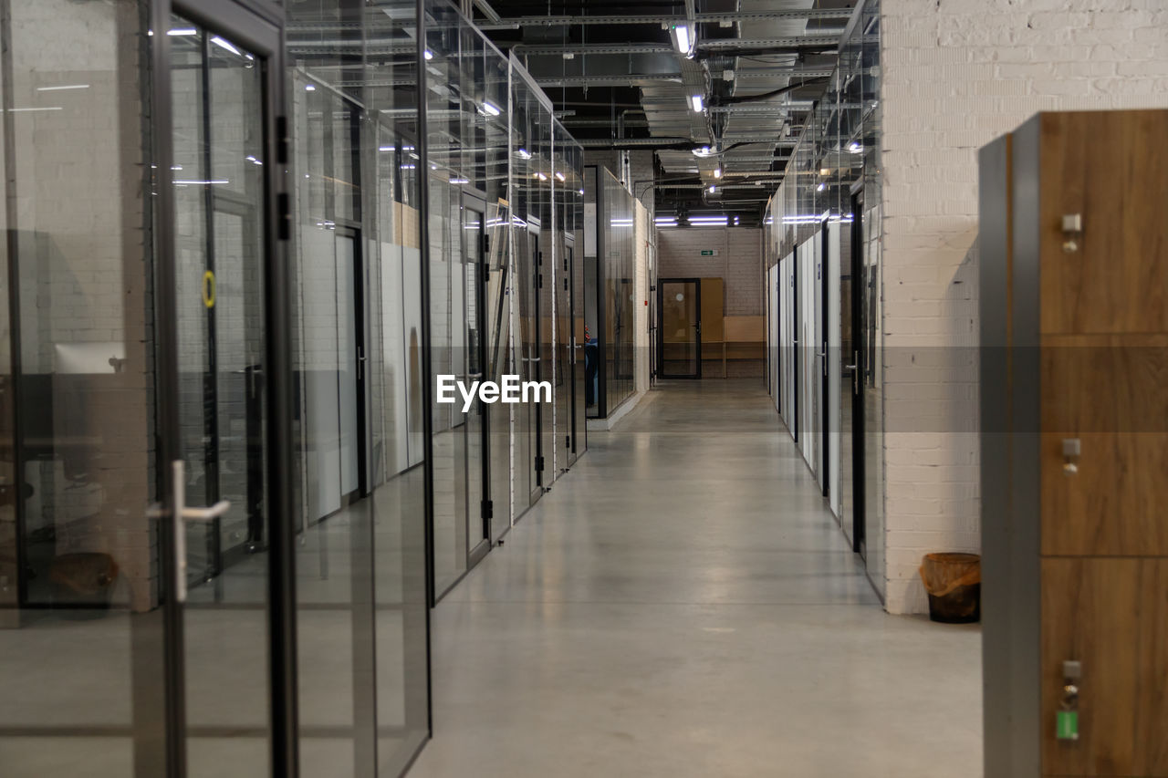 Modern empty office with glass partitions, loft style interior. perspective view