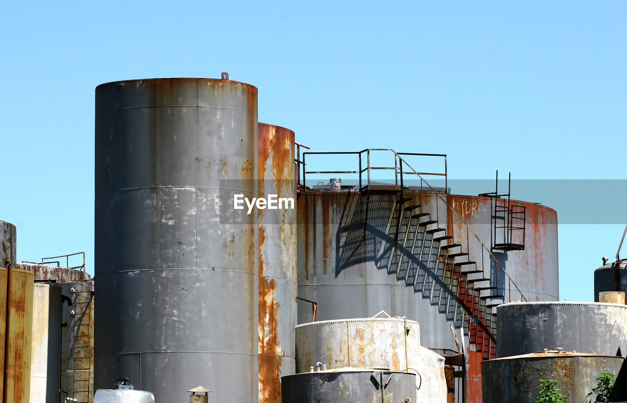 LOW ANGLE VIEW OF INDUSTRY AGAINST SKY