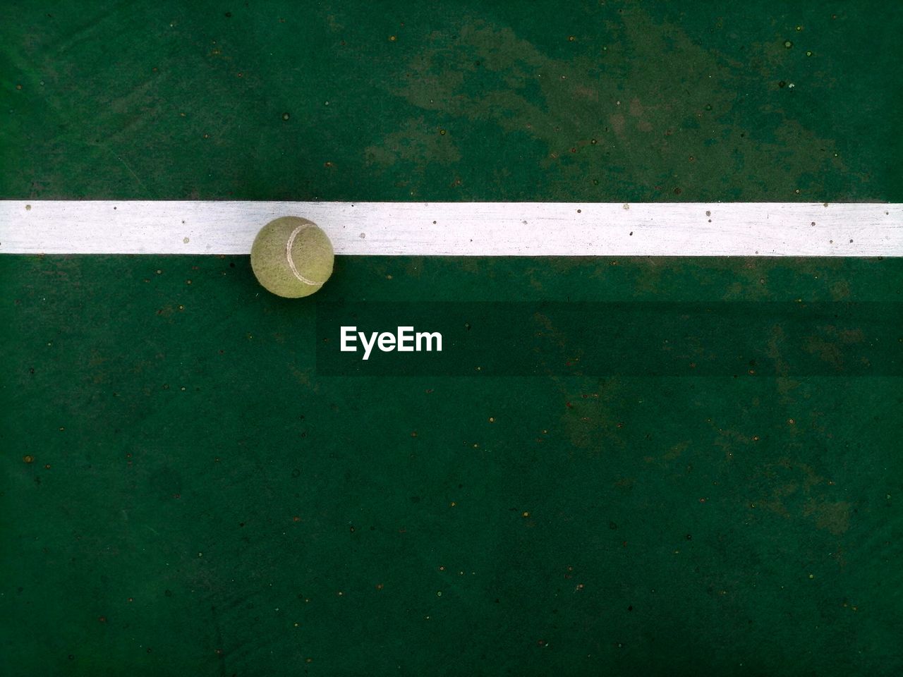 High angle view of tennis ball at paddle tennis court 