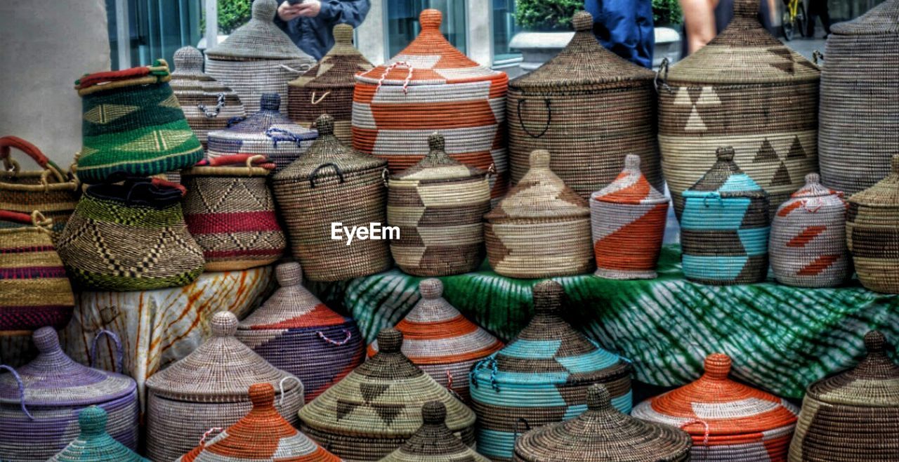 Stack of wicker baskets for sale in market