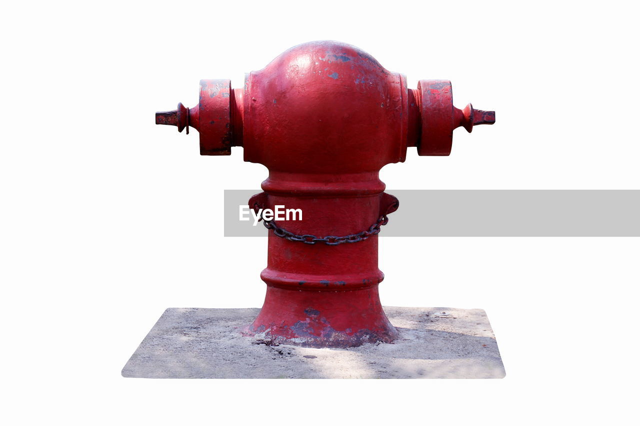 Close-up of fire hydrant against white background