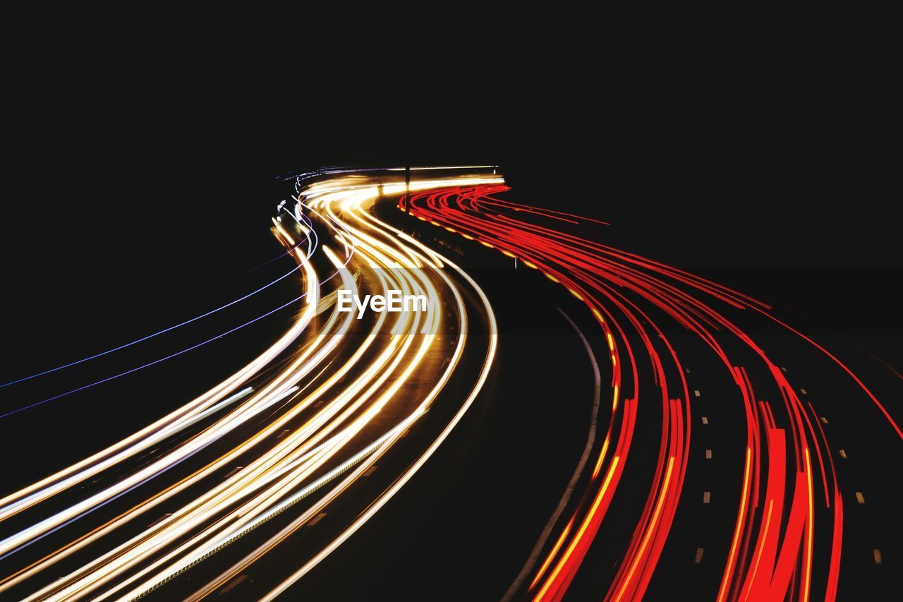 Light trails on road at night