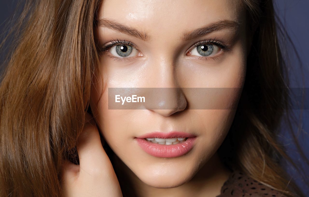 Close-up portrait of young woman