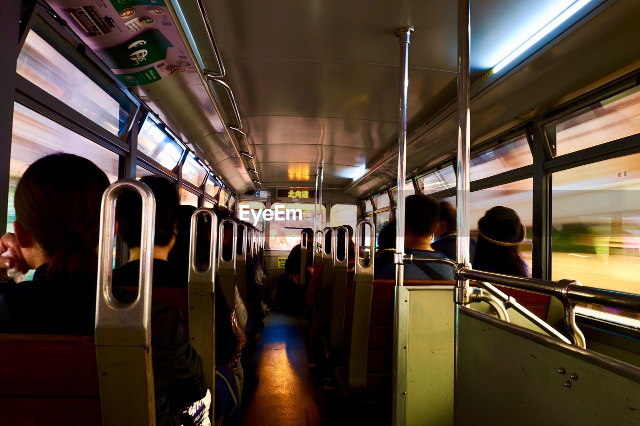 People sitting in subway train