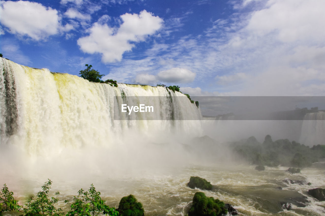 View of waterfall against sky