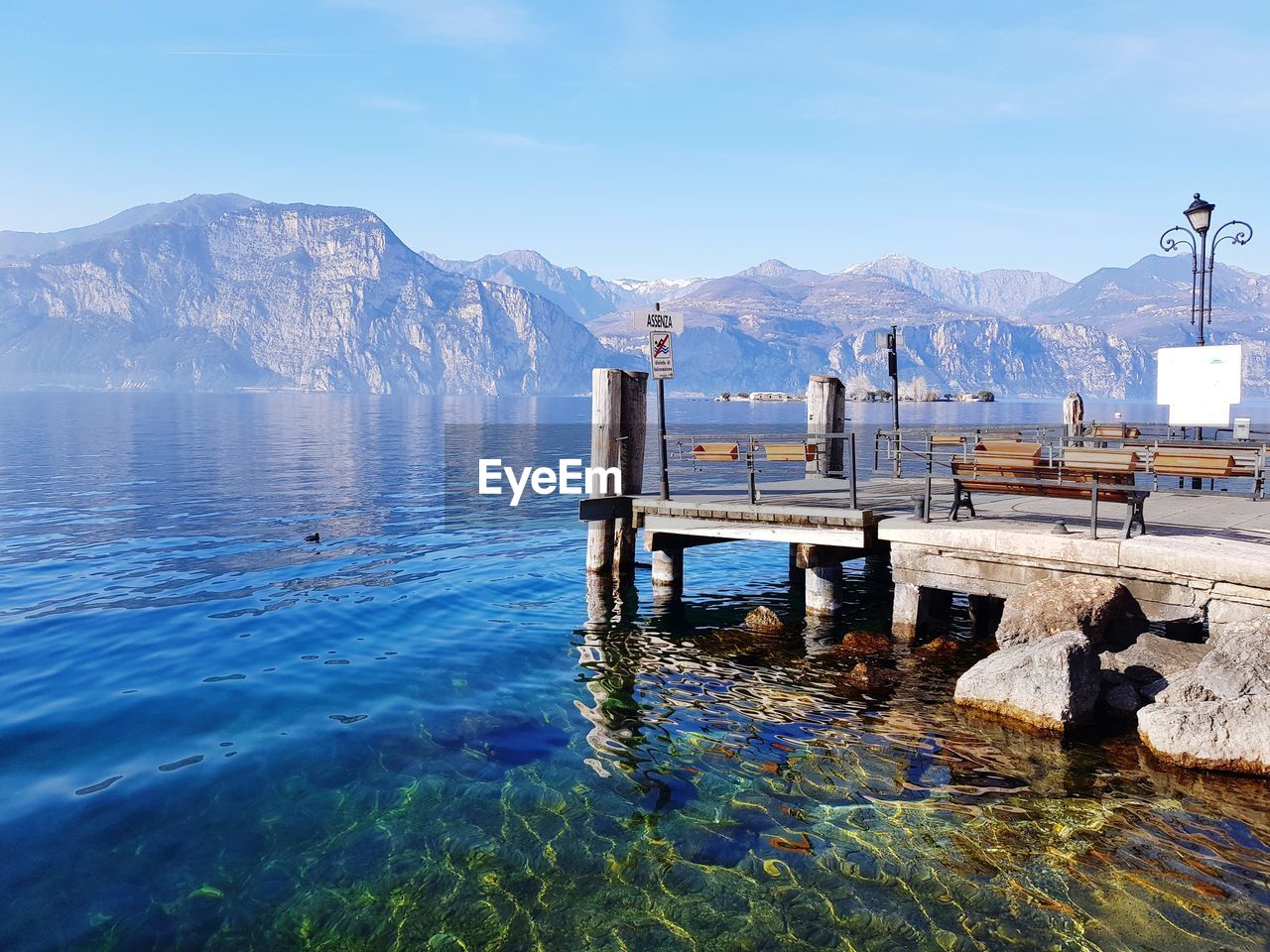 Scenic view of lake and mountain against sky