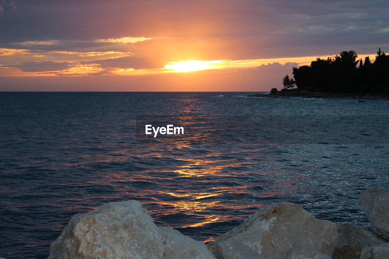 Scenic view of sea during sunset