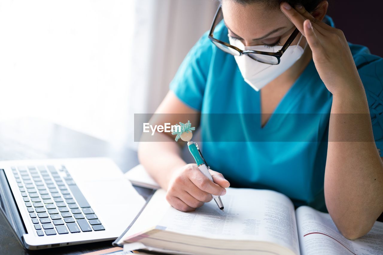 Healthcare worker studying at work