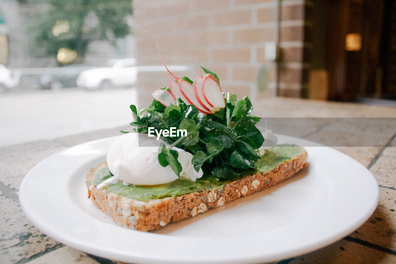 Close-up of healthy food in plate on table