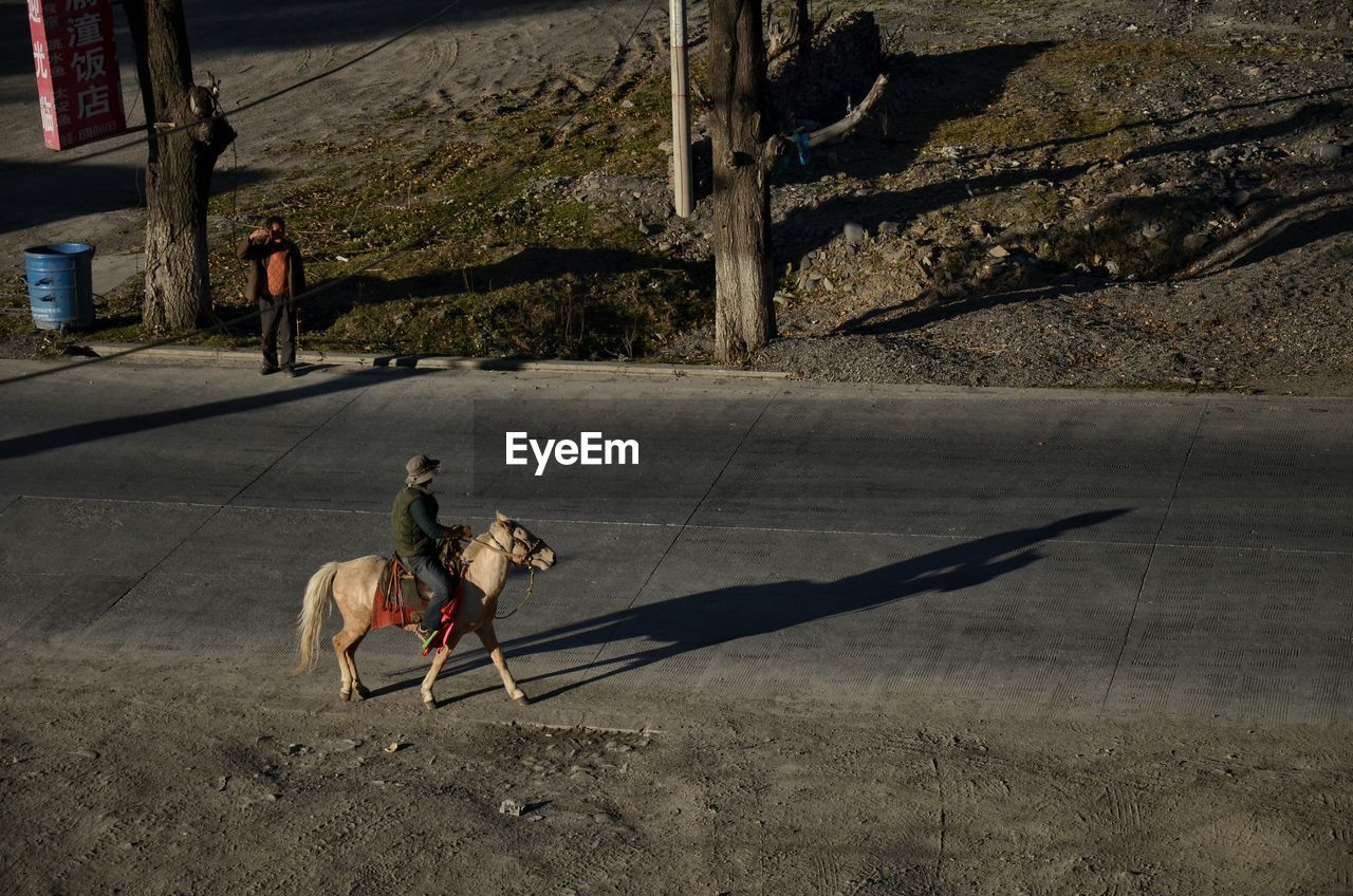 Man riding  on road