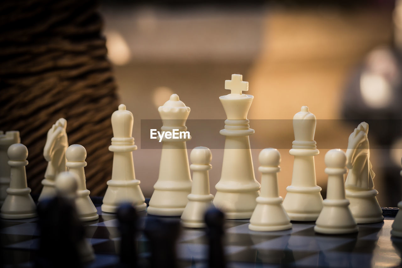 Close-up of chess pieces on board