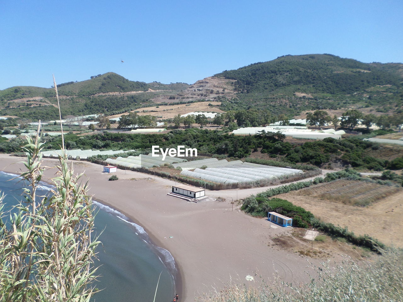 HIGH ANGLE VIEW OF ROAD ALONG LANDSCAPE