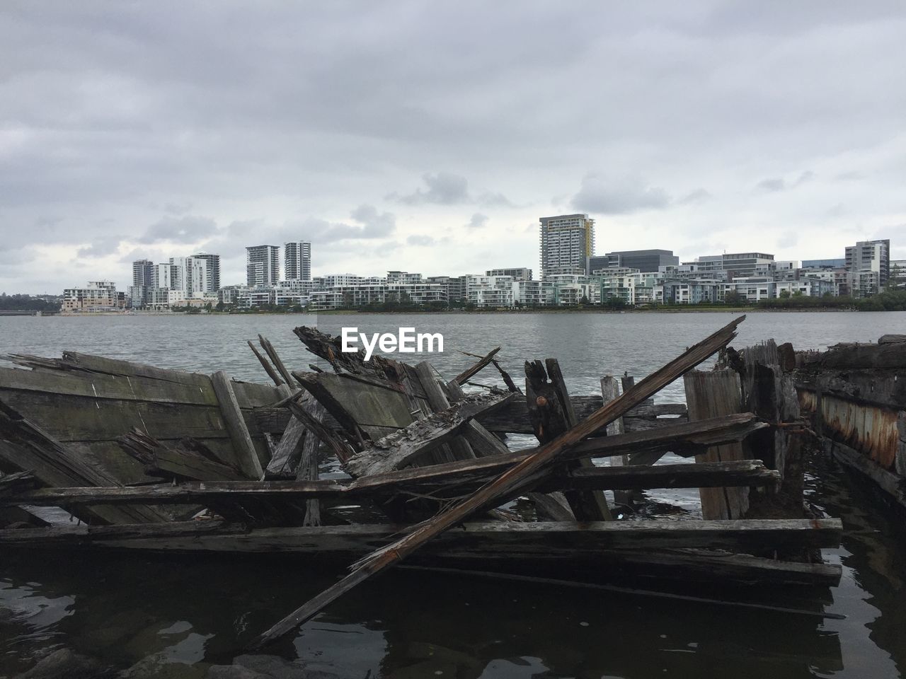 VIEW OF CITYSCAPE WITH RIVER IN BACKGROUND