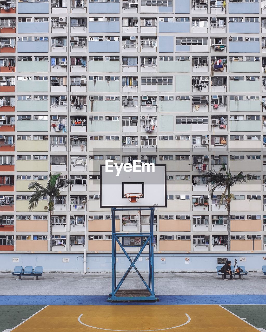 VIEW OF BASKETBALL HOOP IN CITY