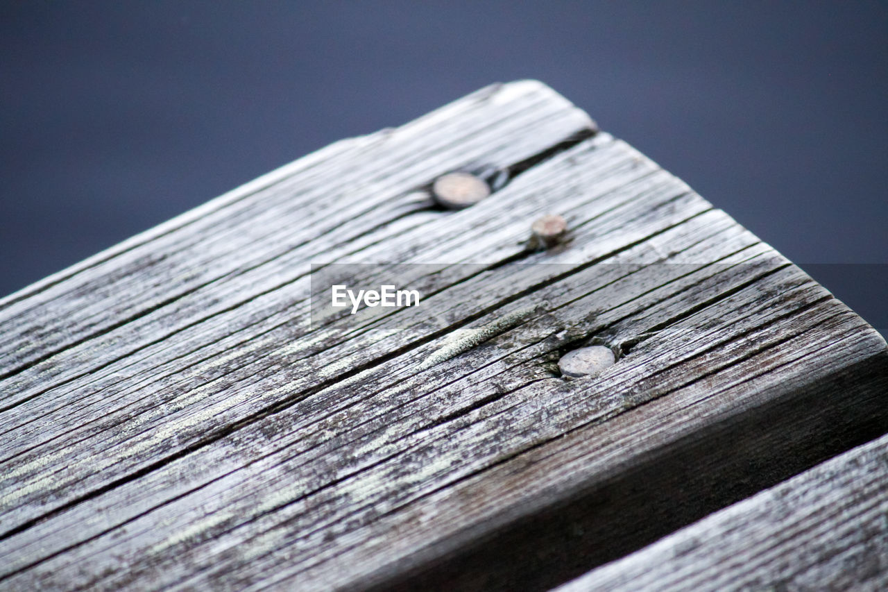 Close-up of wooden plank on table