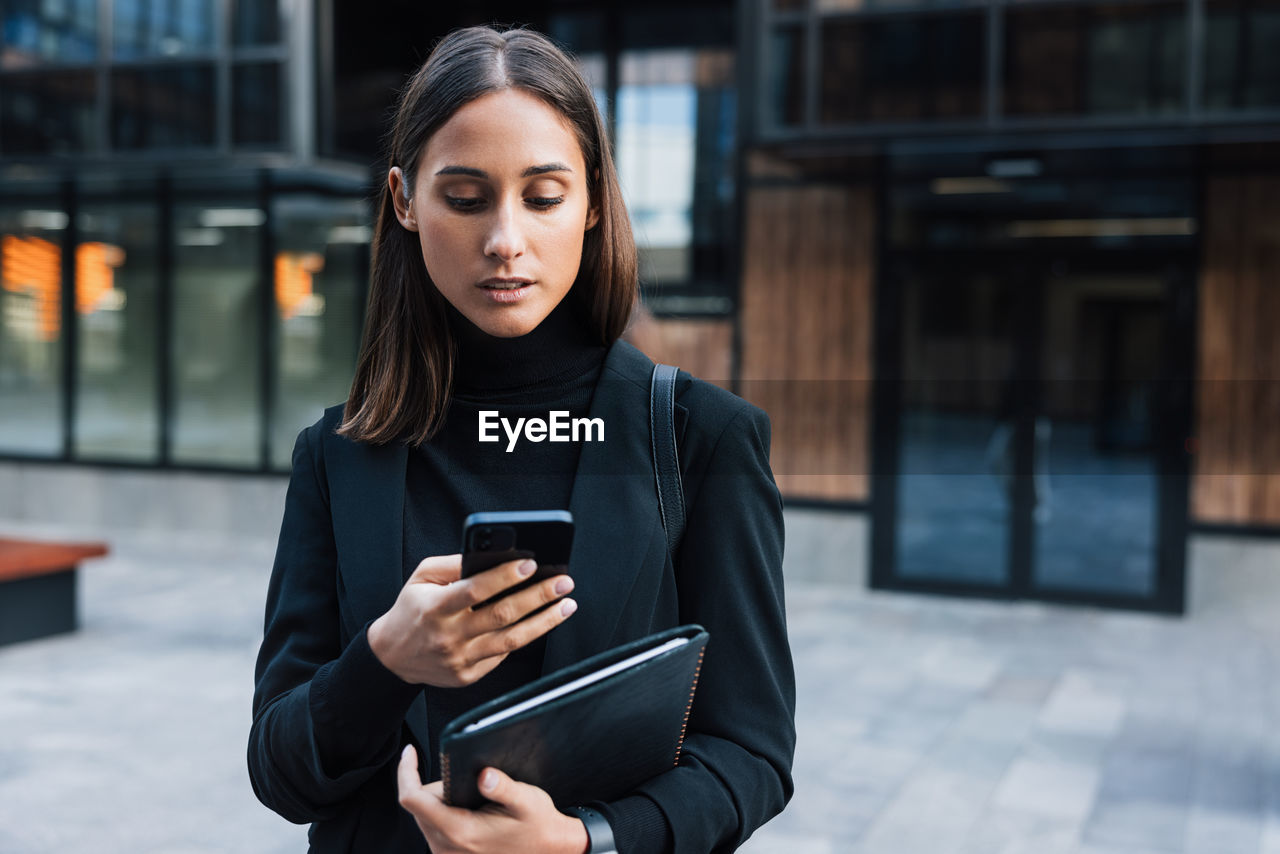 young woman using phone