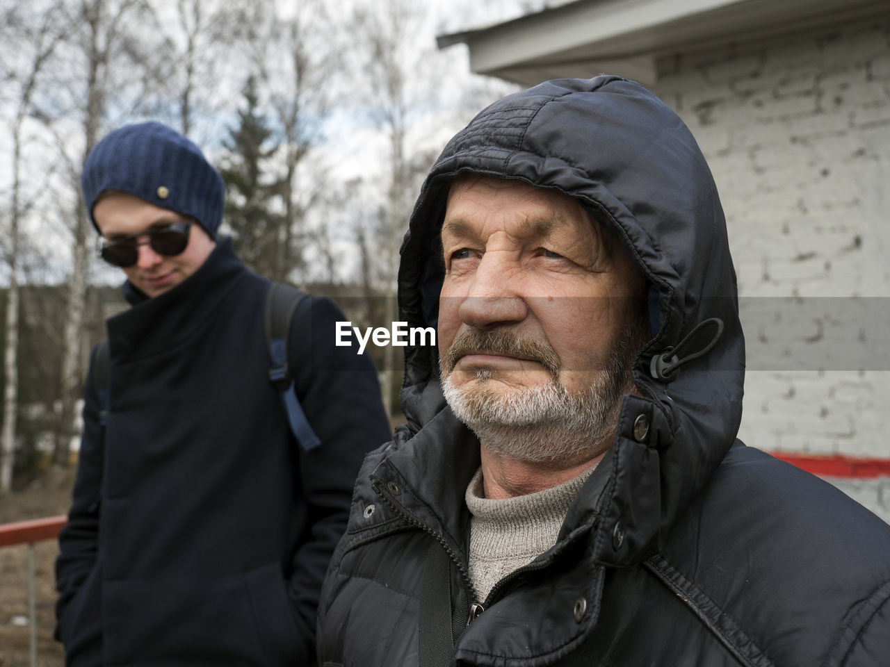 Man looking at father during winter