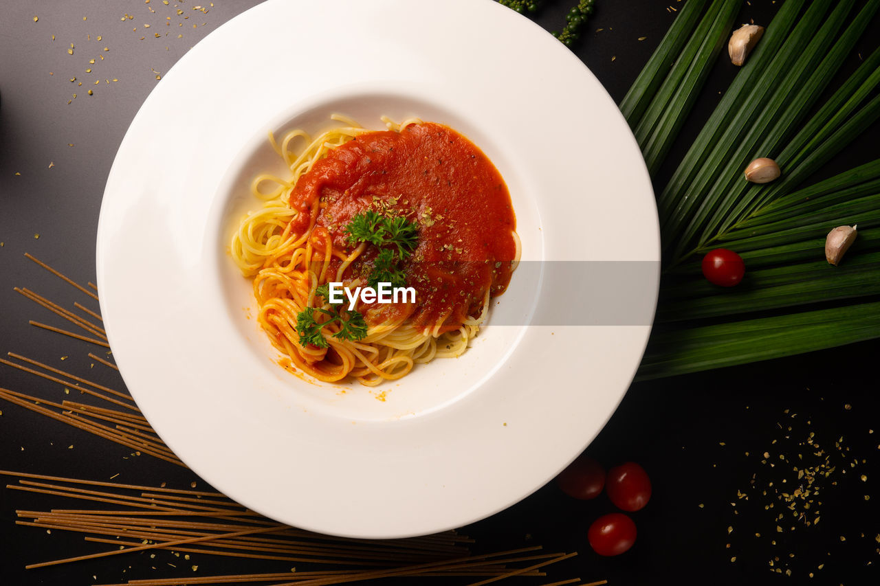 Directly above shot of pasta in plate on table