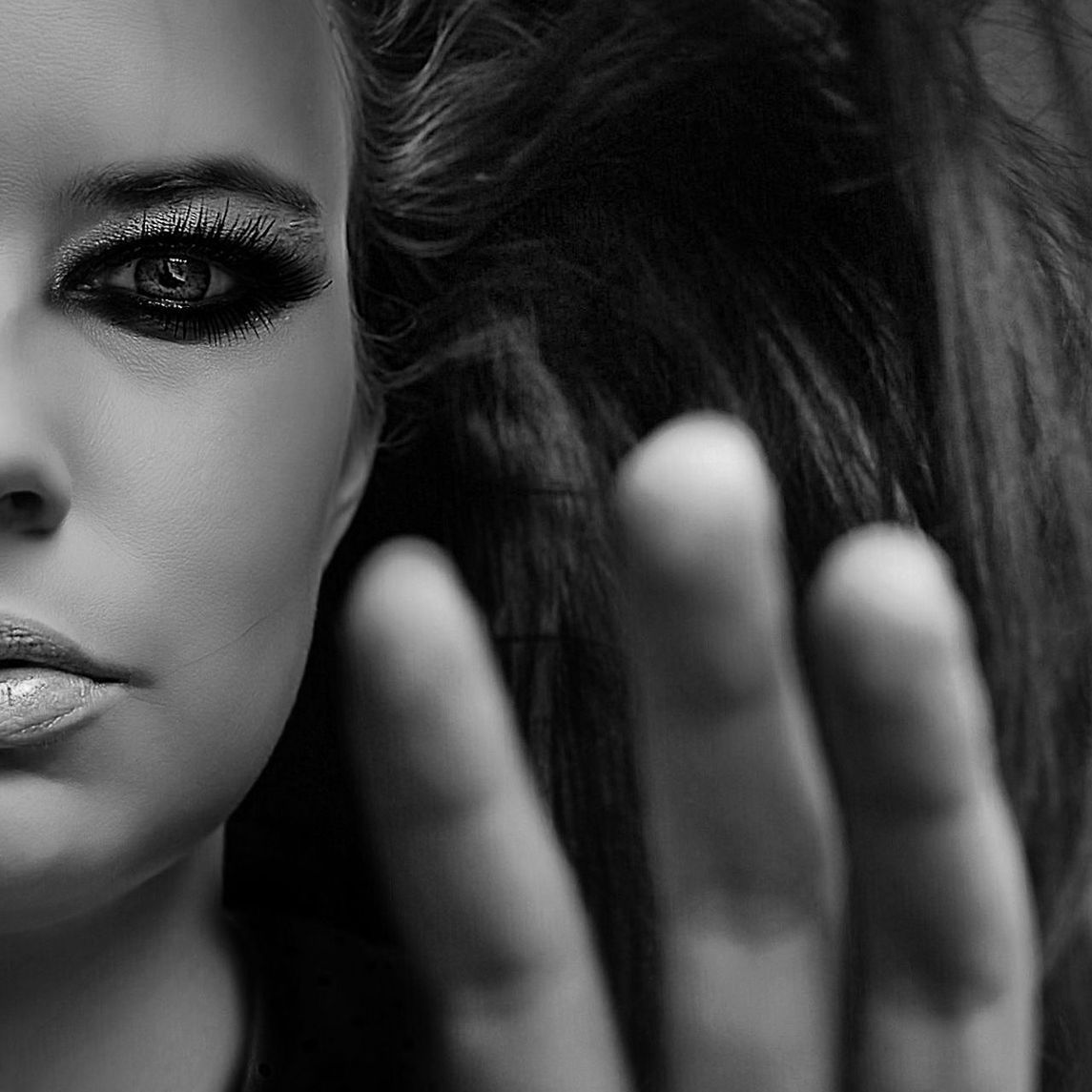 Close-up of young woman in make-up