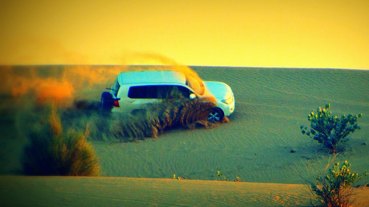 VIEW OF HOT AIR BALLOON IN DESERT