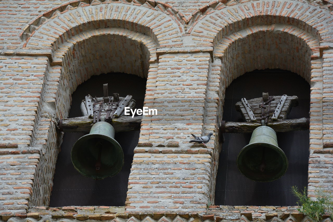 Full frame shot of historic building with bells