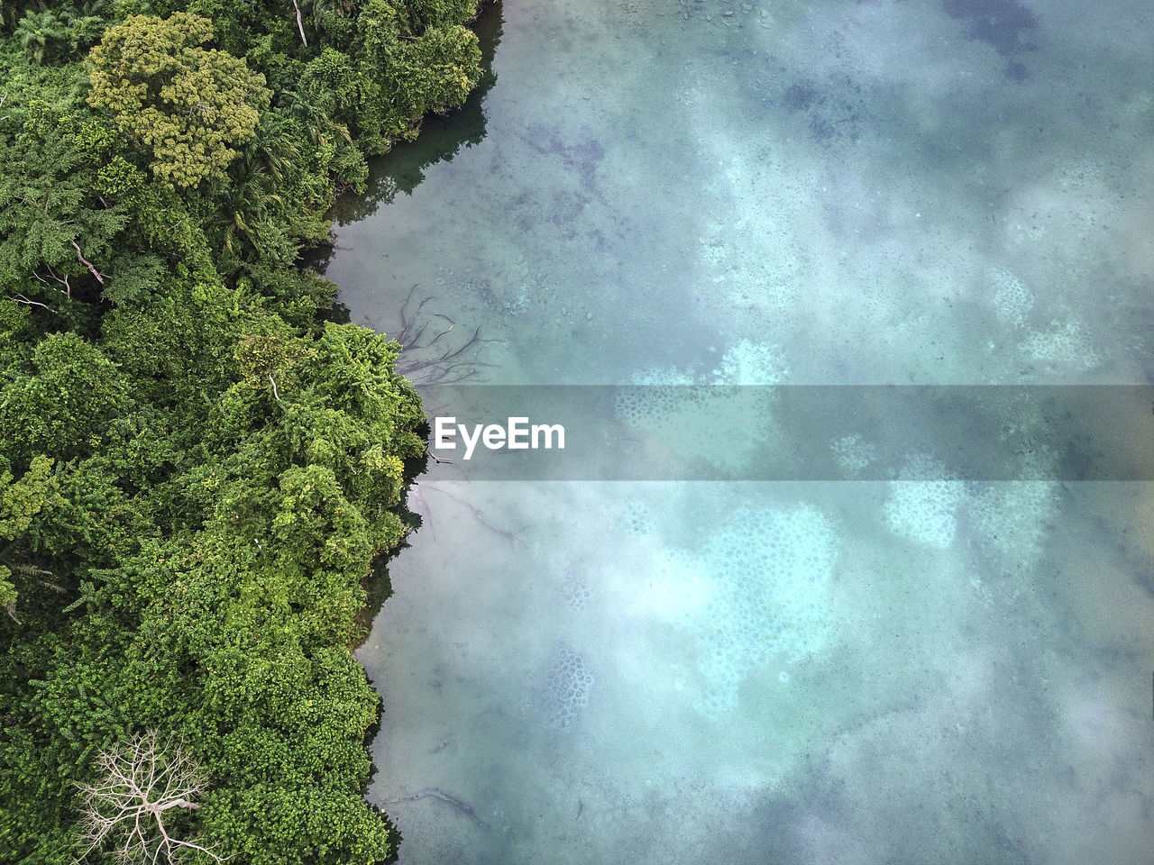 Gabon, aerial view of turquoise colored lac bleu lake