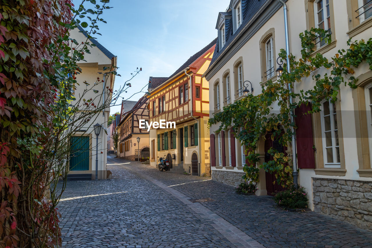 Cobbled road with historic, half-timbered houses in meisenheim, rhineland-palatinate, germany