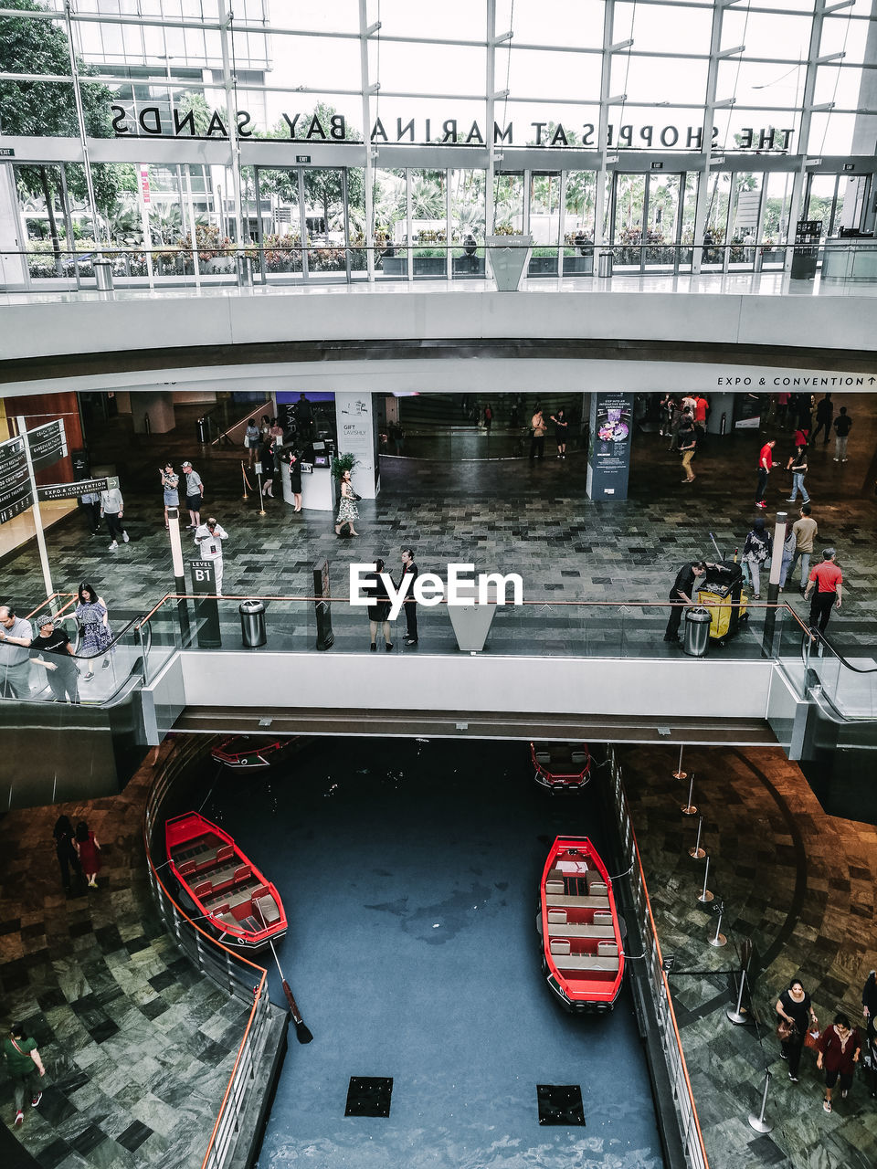 HIGH ANGLE VIEW OF PEOPLE IN RESTAURANT BY WINDOW