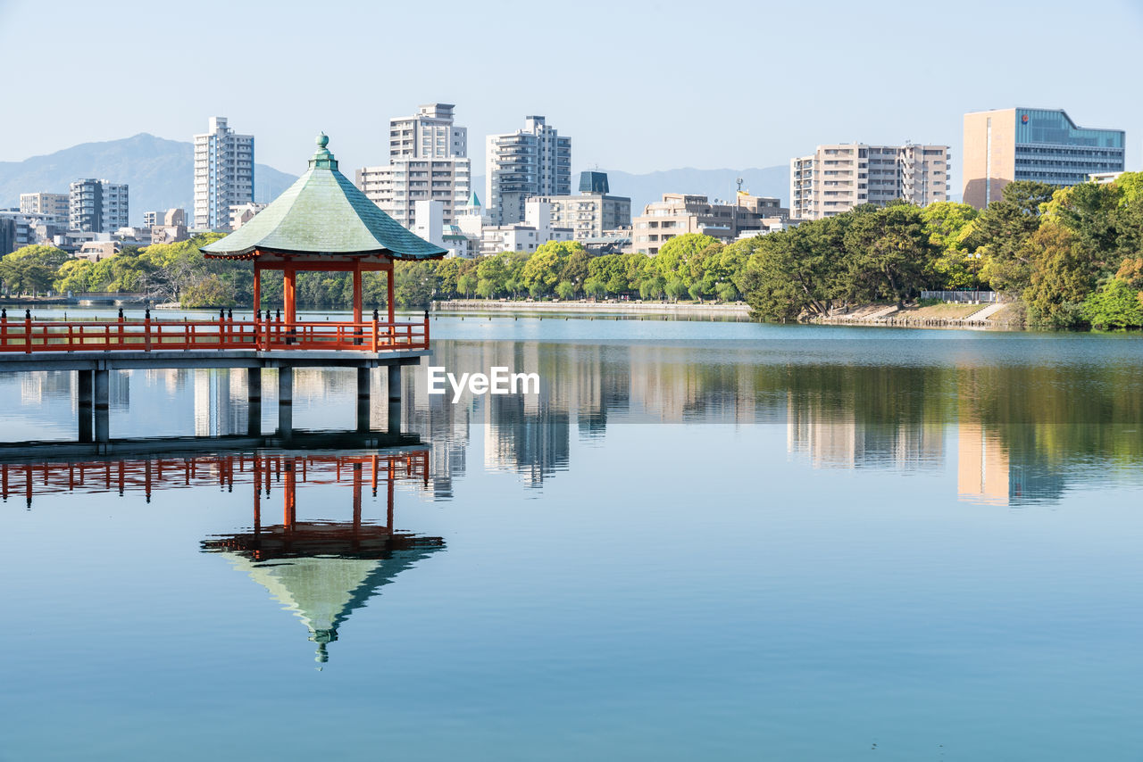 Reflection of buildings in lake