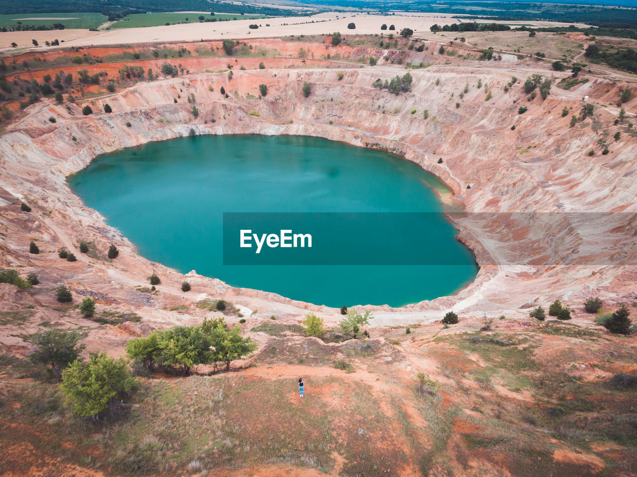 HIGH ANGLE VIEW OF LAKE SEEN THROUGH A LANDSCAPE