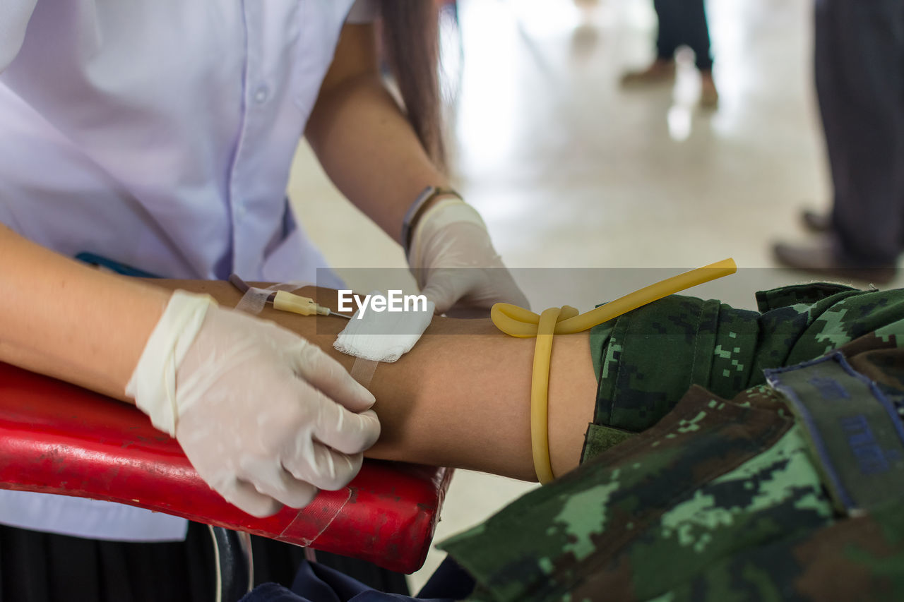 Cropped image of person during blood donation