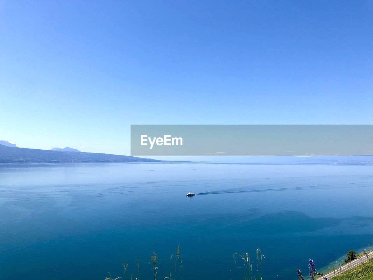 SCENIC VIEW OF BLUE SEA AGAINST SKY