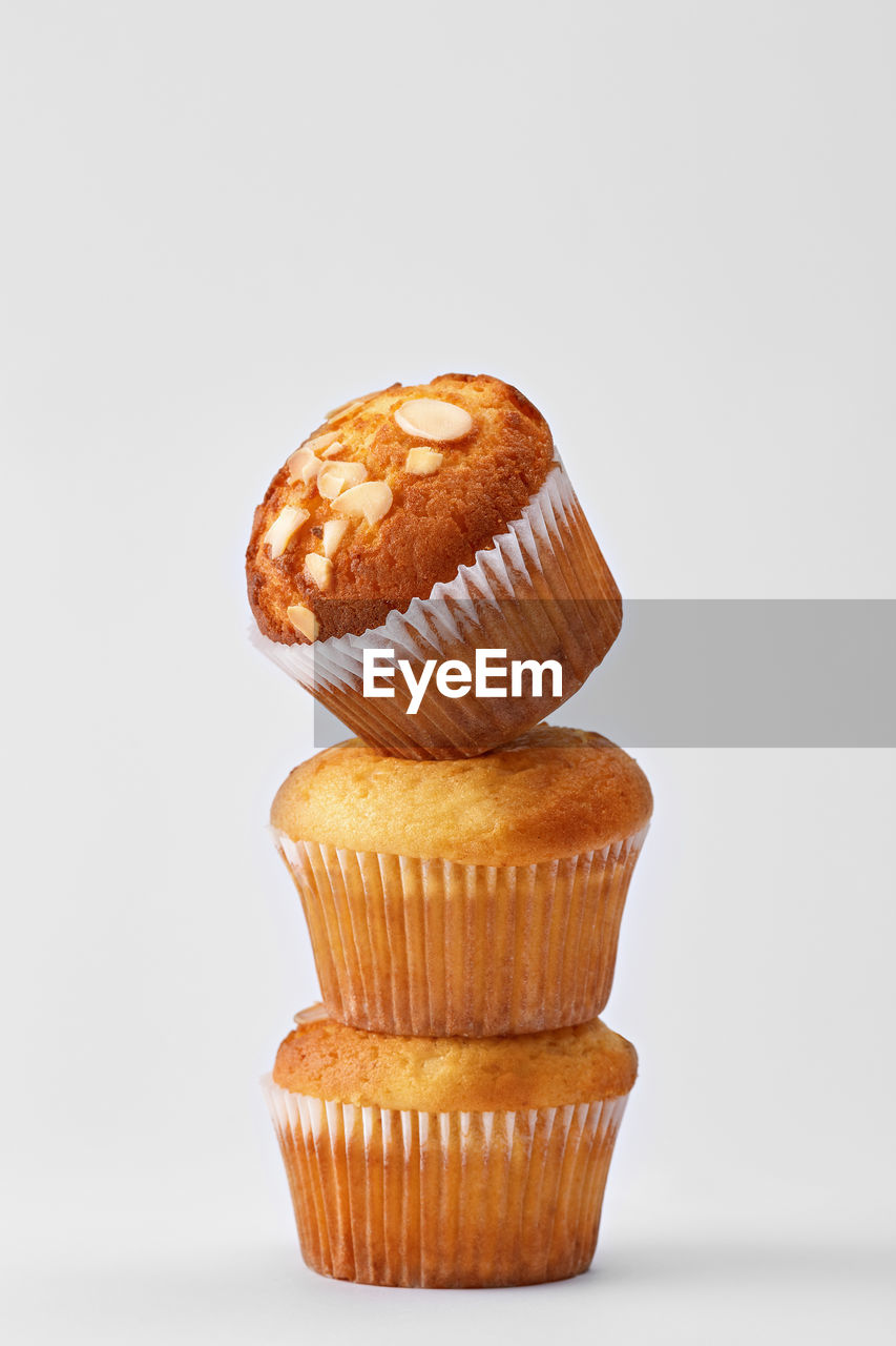 Close-up of cupcakes on white background