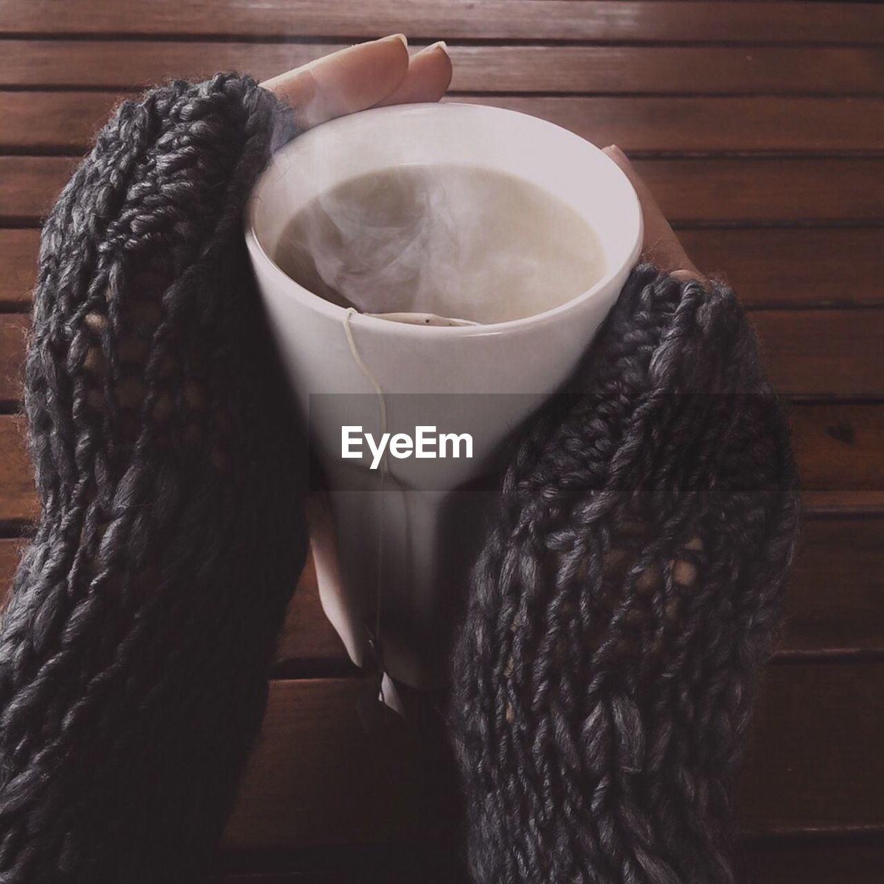 Close-up of woman drinking herbal tea