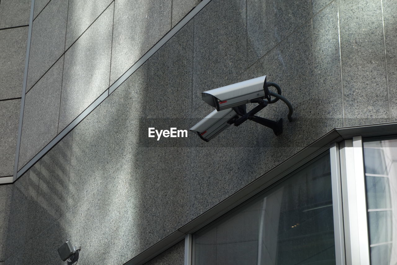 Closed-circuit television, surveillance camera on building exterior