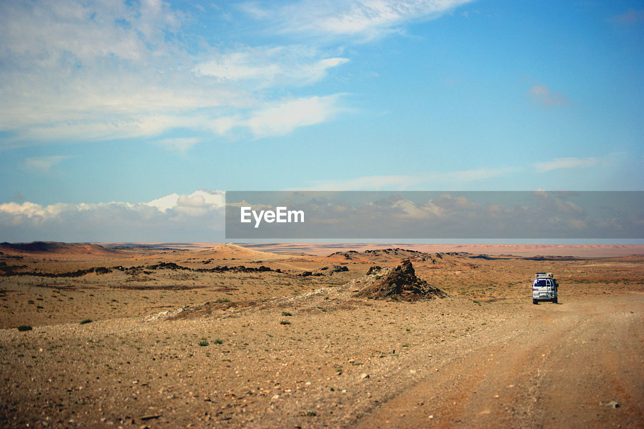 Scenic view of desert against sky